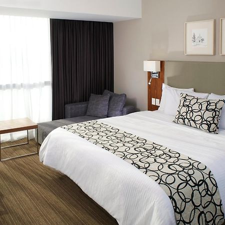 Casa Inn Premium Hotel Queretaro Miranda Экстерьер фото A bed runner
