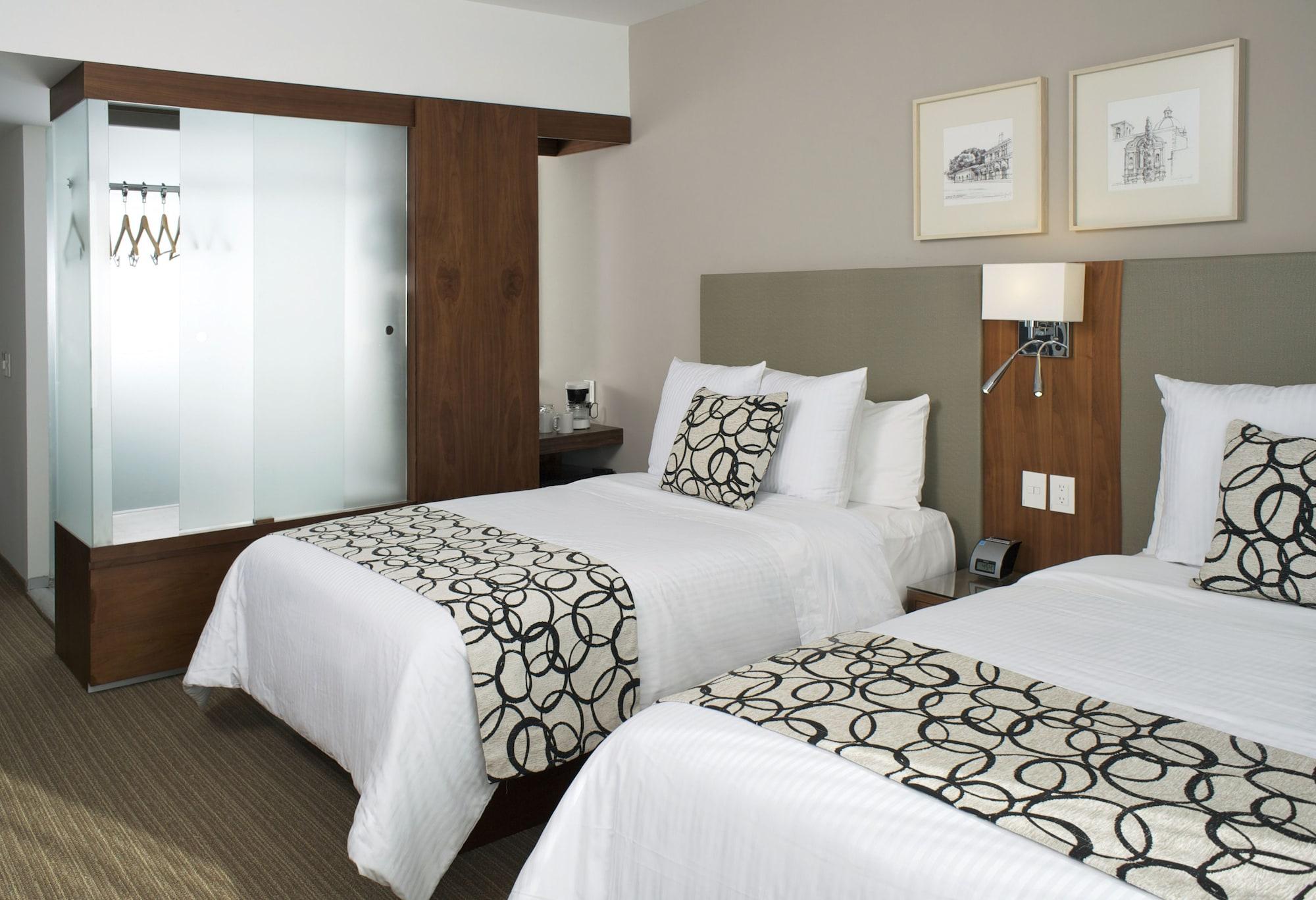 Casa Inn Premium Hotel Queretaro Miranda Экстерьер фото A typical room at the Westin
