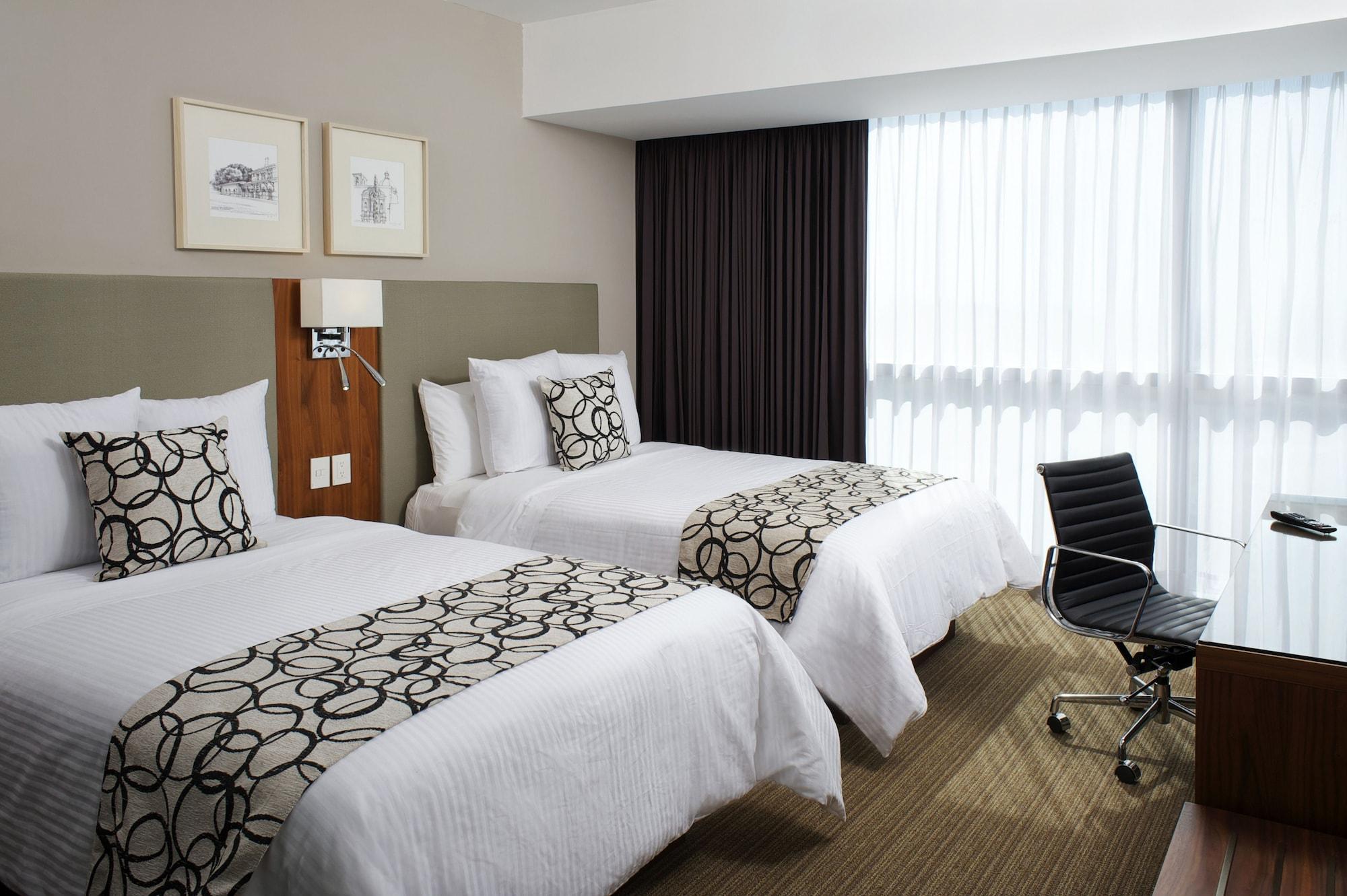Casa Inn Premium Hotel Queretaro Miranda Экстерьер фото A room at the hotel